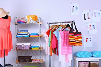 woman wardrobe with clothes and bags