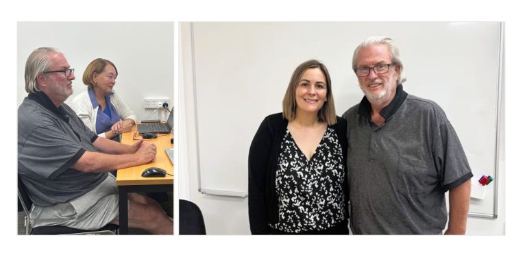 adult students and teacher smiling