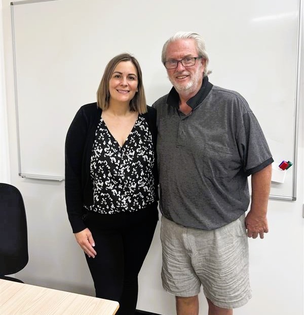 man and woman smiling