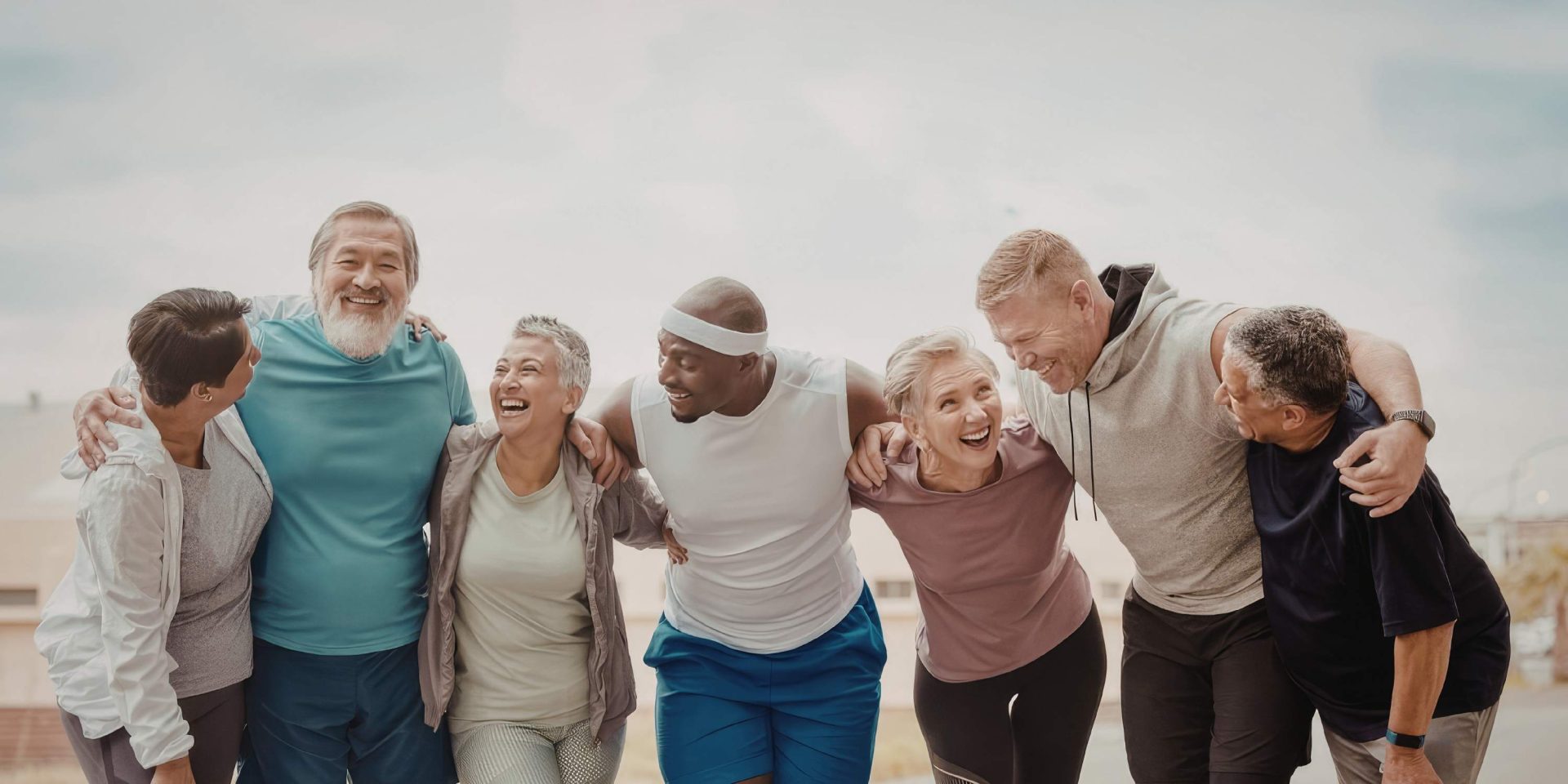 adults laughing during fitness class