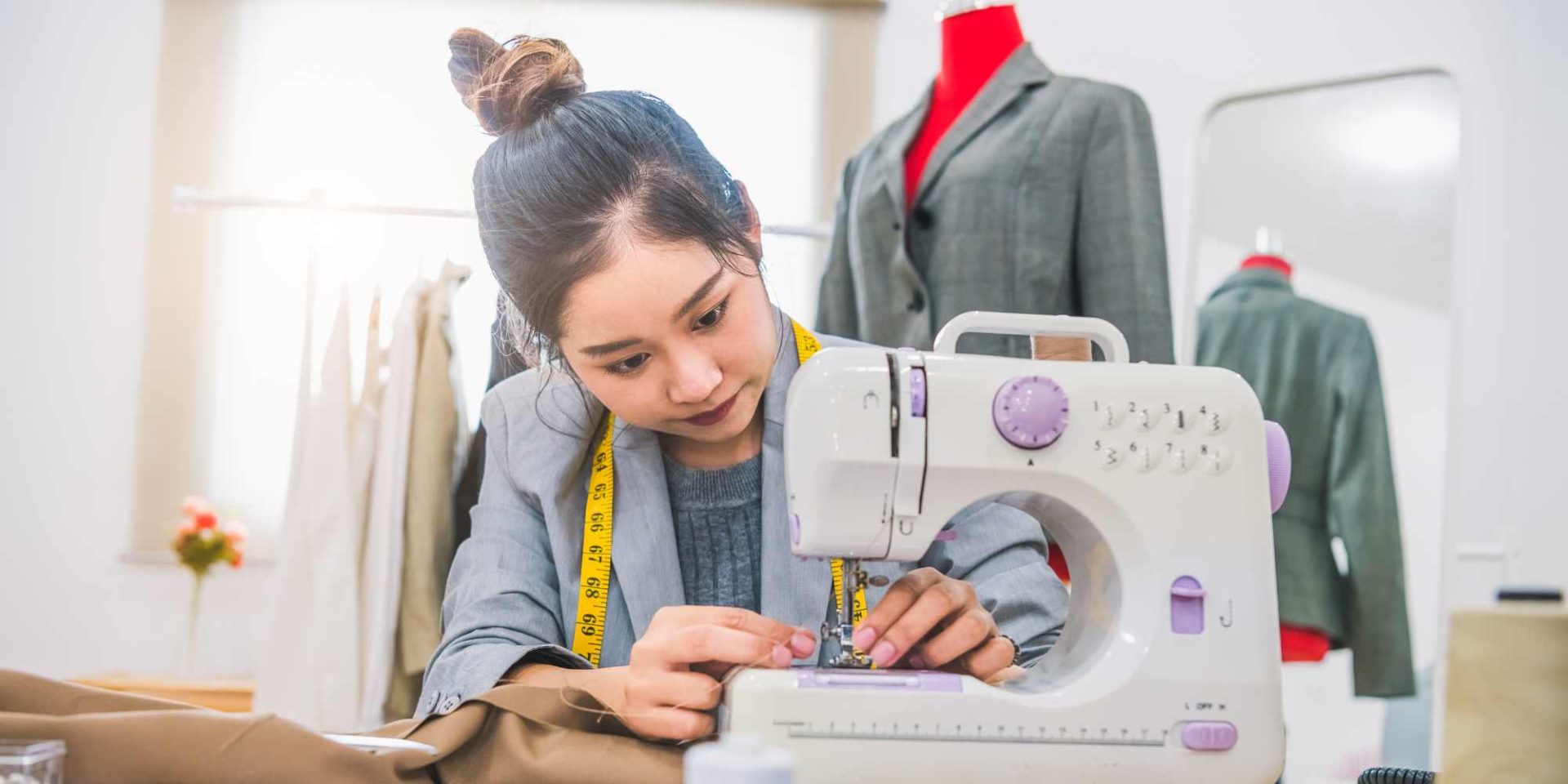 Asian woman sewing