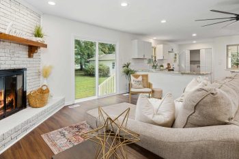 A bright, beautifully styled living room showing a harmonious colour palette with natural light.