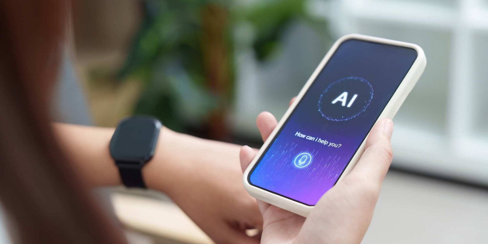 human hand holding smartphone witi AI on the screen