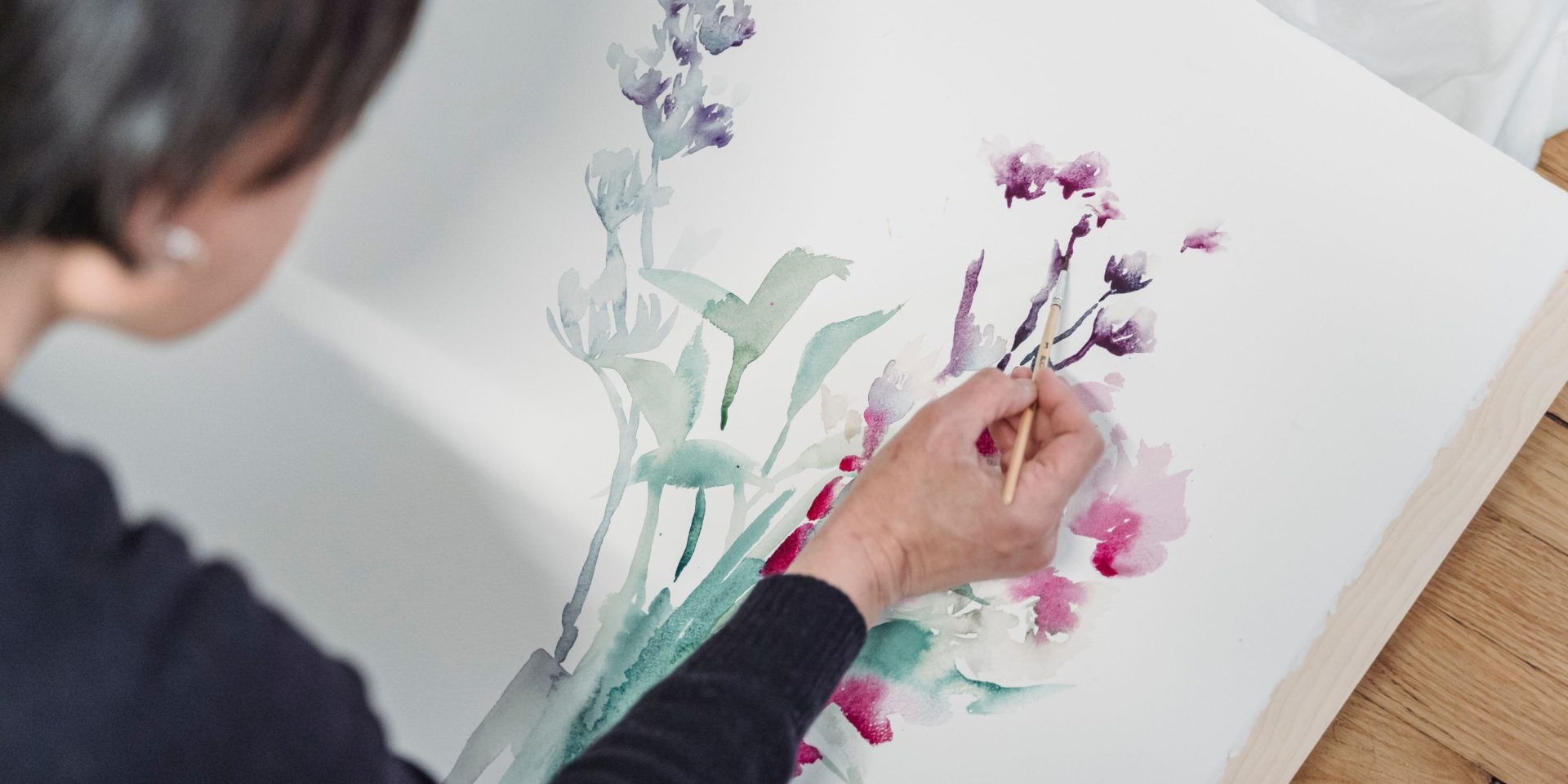 woman painting flowers