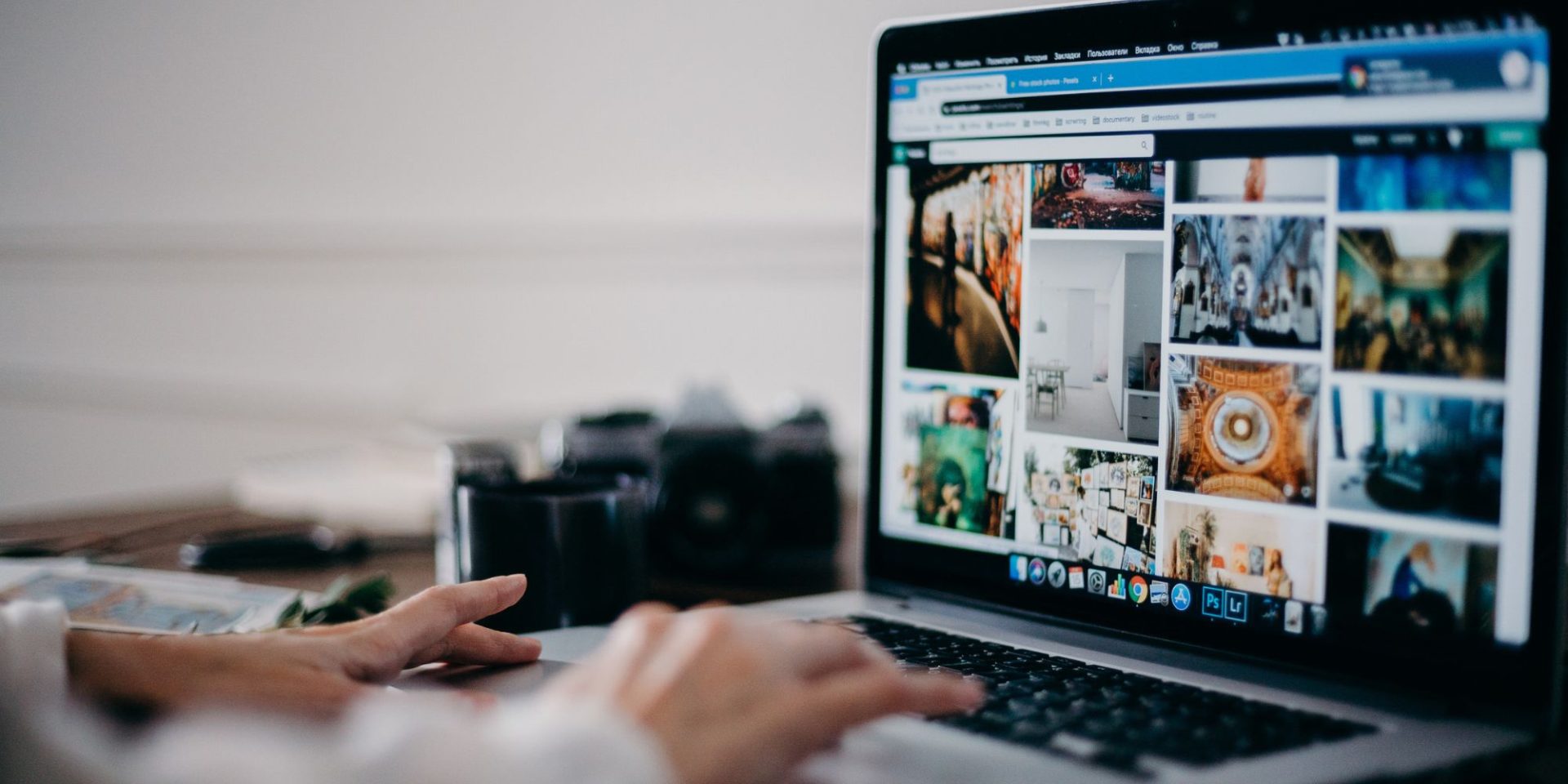 Small business owner creating social media content on a laptop using Canva and video editing tools.