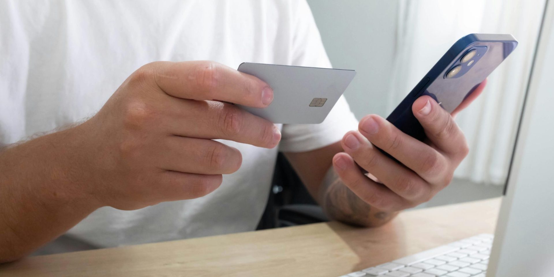 man using his credit card