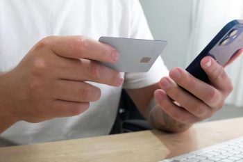 man using his credit card